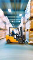 Forklift operator transporting goods in a busy warehouse during daylight hours photo