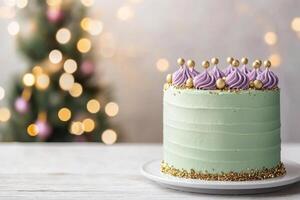 Festive holiday cake decorated with green frosting and ornaments on a blurred background photo