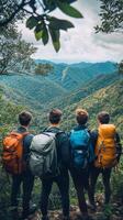 Group of friends enjoying a mountain view during a hiking adventure in nature photo