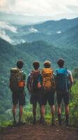 Group of friends enjoying a mountain view during a hiking adventure in nature photo