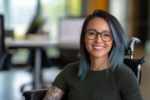 Young woman in wheelchair smiles while sitting in modern workspace with natural light photo