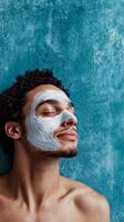 Man enjoying facial mask treatment in a vibrant indoor setting for skincare relaxation photo