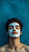 Man enjoying facial mask treatment in a vibrant indoor setting for skincare relaxation photo