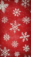 Bright red background with white snowflakes creating a festive winter atmosphere photo