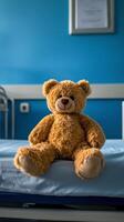 Soft bear sitting on a bed in a cozy blue room with calming atmosphere photo