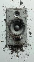 Explosive sound wave with shattered speaker parts in dynamic display of energy and motion photo