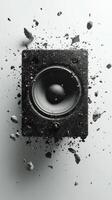 Explosive sound wave with shattered speaker parts in dynamic display of energy and motion photo