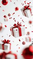 Gift boxes and decorations falling amidst snowflakes in a festive atmosphere during winter photo