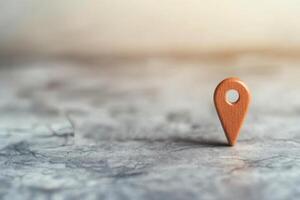 Location pin symbol on a snowy landscape with distant city skyline in winter setting photo