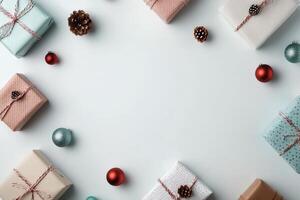 Beautifully wrapped holiday gifts arranged neatly on a white surface with pine cones photo