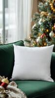 Cozy green couch adorned with seasonal decor and a blank pillow in a warm living room atmosphere photo