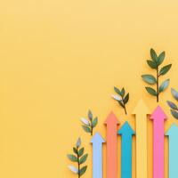 Colorful arrows pointing upwards on a yellow background symbolize growth and progress photo
