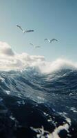 Seagulls soaring above crashing waves at a stormy seaside photo