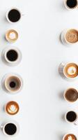 Different shades of coffee served in cups arranged on a white background in a cafe photo