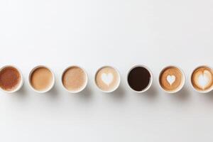 Different styles of coffee cups arranged in a row on a light background showcasing variety photo