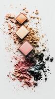 Makeup powder in various shades scattered artistically on a surface photo