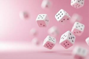 Floating white dice create playful patterns in the air against a soft pink background photo
