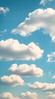Soft white cloud drifting in a clear blue sky during daytime photo