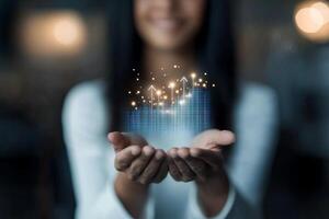 Smiling professional woman presenting data analytics concept with glowing graph photo