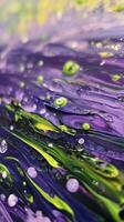 Abstract colorful swirl of purple, green, and yellow paint blending together in creative pattern photo