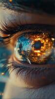 Close up view of an eye reflecting digital data and technology at night photo