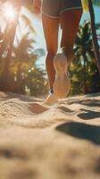 Running on sandy beach during sunset with palm trees in the background photo