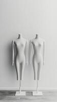 Mannequins displayed in a well lit studio showcasing fashion design concepts photo