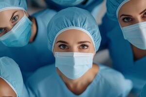 Healthcare professionals in blue scrubs and masks ready for service in a clinical setting photo