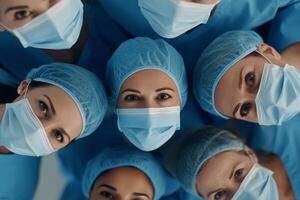 Healthcare professionals in blue scrubs and masks ready for service in a clinical setting photo