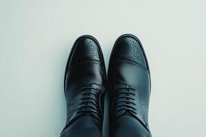 Elegant black dress shoes displayed on a clean surface for fashion and style inspiration photo