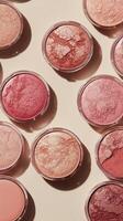 Varied blush colors displayed in a circular arrangement on a neutral backdrop photo