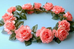Beautiful pink roses frame a serene blue sky during a sunny afternoon in a garden photo