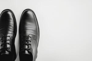 Elegant black dress shoes displayed on a clean surface for fashion and style inspiration photo