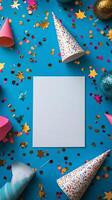 Colorful party decorations arranged on a bright blue surface with a blank space for message photo
