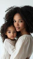 Mother and child sharing a tender moment indoors with warm lighting photo
