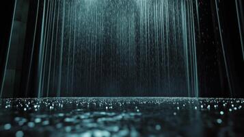 Dark space with heavy rain creating a moody atmosphere and reflective surface photo