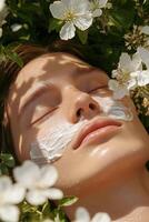 Relaxing skincare routine in a flower garden during soft daylight photo