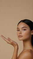 Model showcasing natural beauty with soft makeup and glowing skin in neutral background photo