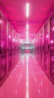 Bright pink illuminated server room with rows of servers and glowing lights photo