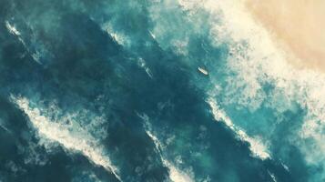 Waves crashing on a serene beach under a bright blue sky in the early afternoon photo