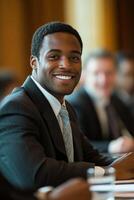 Mature business professional in a meeting with colleagues showing focus and determination photo