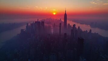 Vibrant sunset over Hong Kong harbor with silhouettes of skyscrapers and distant islands photo
