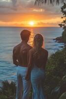 Smiling couple enjoying beach sunset with natural hairstyles and vibrant clothing photo