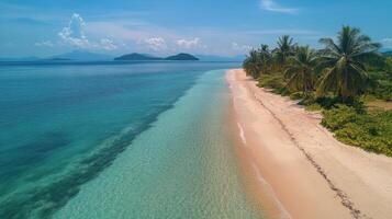 Serene beach resort on a tropical island surrounded by lush mountains and clear water photo