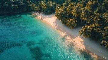 Serene beach resort on a tropical island surrounded by lush mountains and clear water photo