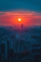 Vibrant city skyline illuminated under colorful sunset with mountains in the background photo