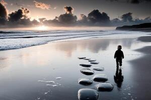 A person walking on the beach with rocks in their hand photo