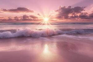 Sunset on the beach with waves and pink sky photo
