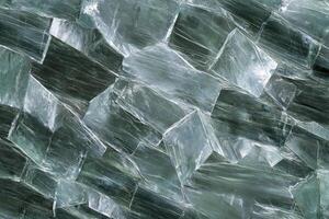 A close up of a large piece of green glass photo