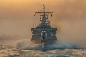 A military ship is sailing through the water photo